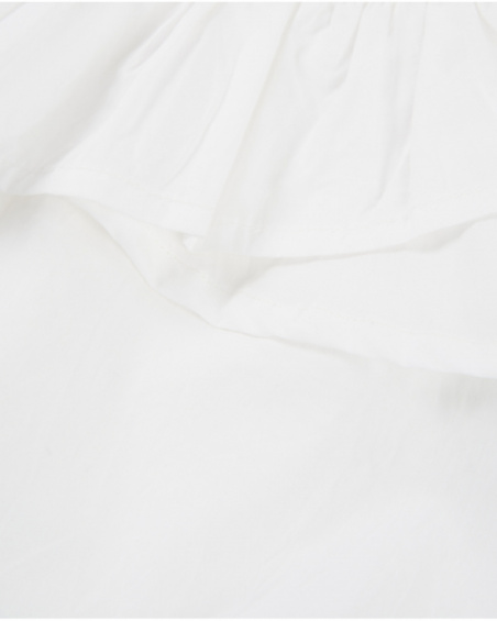 Blusa de niña de plana de diseño asimétrico con volante