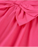 Vestido de niña de plana con un gran lazo