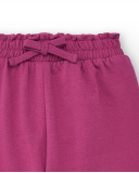 Pantalón de felpa para niña en color fucsia con lazo colección Pantalón de felpa para niña en color fucsia con lazo colección