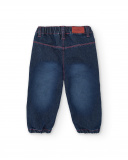 Pantalón vaquero para niña en azul con estampado floral Pantalón vaquero para niña en azul con estampado floral