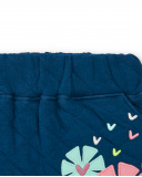 Falda acolchada azul con detalles de flores para niña de la Falda acolchada azul con detalles de flores para niña de la