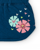 Falda acolchada azul con detalles de flores para niña de la Falda acolchada azul con detalles de flores para niña de la