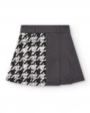 Falda de sarga con detalle de botones y estampado pata de gallo Falda de sarga con detalle de botones y estampado pata de gallo
