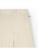 Pantalón acampanado niña en color beige con textura trenzada Pantalón acampanado niña en color beige con textura trenzada