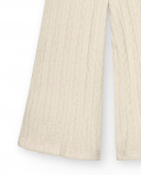 Pantalón acampanado niña en color beige con textura trenzada Pantalón acampanado niña en color beige con textura trenzada