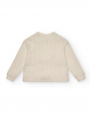 Jersey niña en color beige con textura trenzada colección The Jersey niña en color beige con textura trenzada colección The
