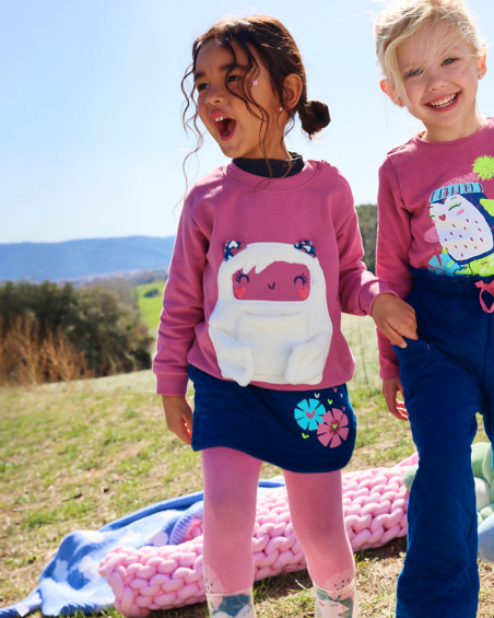 Falda acolchada azul con detalles de flores para niña de la Falda acolchada azul con detalles de flores para niña de la