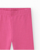 Leggings de punto para niña en color rosa con estampado tropical Leggings de punto para niña en color rosa con estampado tropical