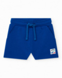Bermuda para niño en azul con cintura ajustable y parche bordado Bermuda para niño en azul con cintura ajustable y parche bordado