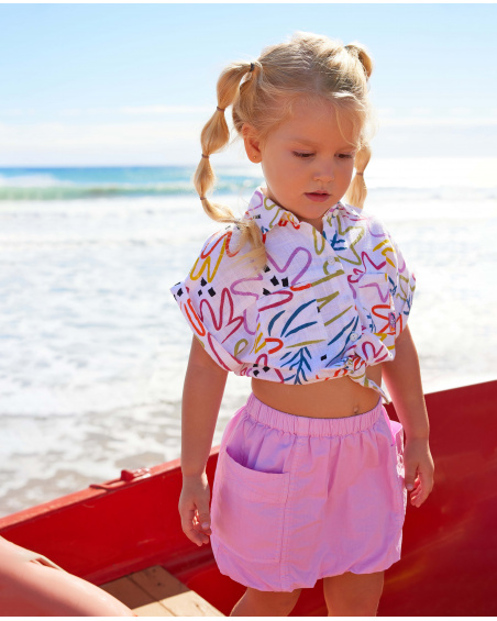 Falda para niña en rosa con bolsillos y cintura elástica Falda para niña en rosa con bolsillos y cintura elástica