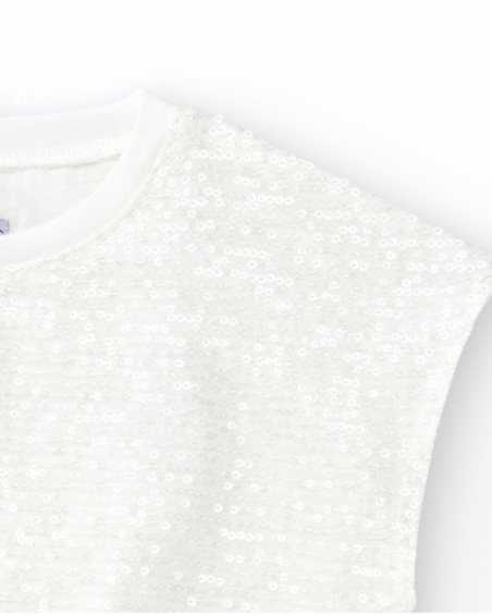 Camiseta para niña en blanco con lentejuelas y bajo elástico