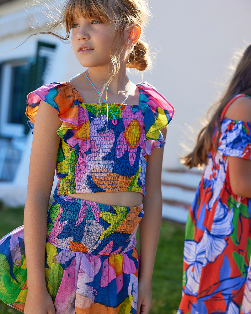 Conjunto de blusa y falda para niña con estampado floral multicolor