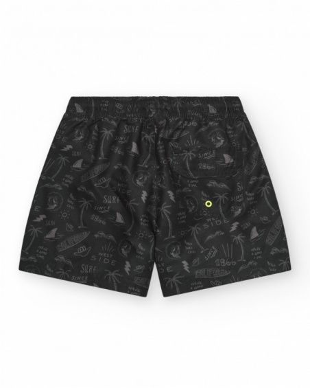 Bañador para niño en negro con estampado surfero y cordón flúor. Bañador para niño en negro con estampado surfero y cordón flúor.