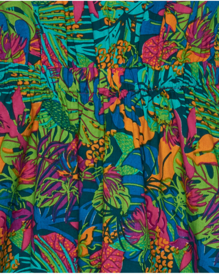 Vestido para niña con estampado tropical multicolor y tirantes cruzados. Vestido para niña con estampado tropical multicolor y tirantes cruzados.