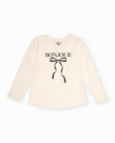 Camiseta de manga larga color crema con lazo estampado