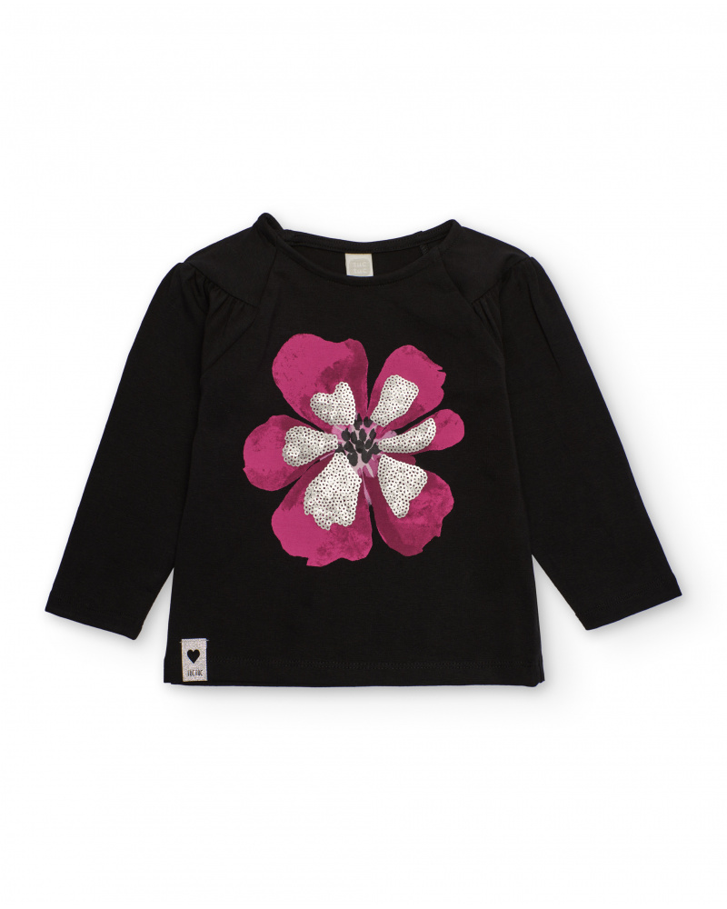 Camiseta de niña en negro con flor fucsia y lentejuelas