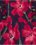 Vestido de niña con estampado floral rojo sobre fondo azul