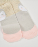 Leotardo de recién nacido en beige con diseño de pingüino