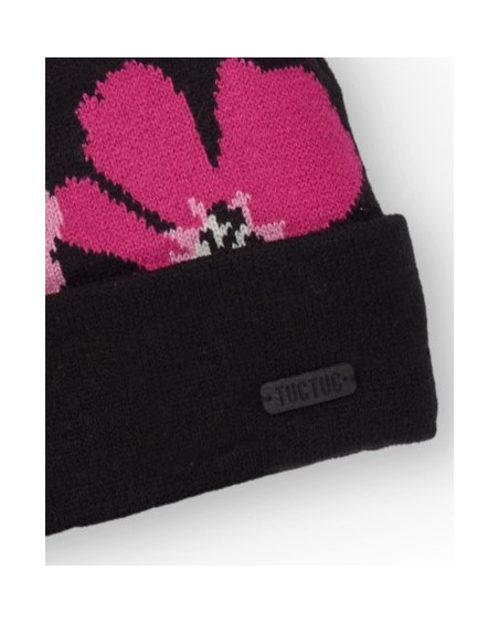 Gorro de niña negro con estampado floral y pompón rosa
