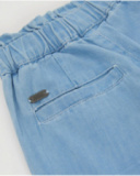 Pantalones de niña de plana y denim claro