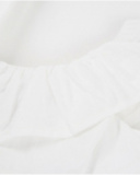 Blusa de niña de plana de diseño asimétrico con volante