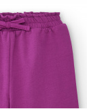 Pantalon fille de couleur fuchsia avec nœud décoratif Pantalon fille de couleur fuchsia avec nœud décoratif