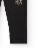 Pantalon peluche garçon noir avec détail "Don't Stop" Pantalon peluche garçon noir avec détail "Don't Stop"