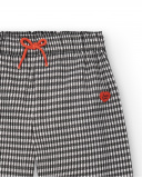 Pantalon vichy noir et blanc avec noeud rouge pour fille de la Pantalon vichy noir et blanc avec noeud rouge pour fille de la