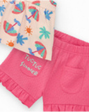 Conjunto crema para niña con blusa de paraguas y shorts rosa