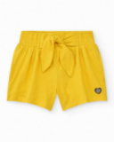 Short jaune pour fille avec nœud décoratif et taille élastique Short jaune pour fille avec nœud décoratif et taille élastique