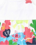 Robe blanche pour fille avec bretelles croisées et jupe fleurie