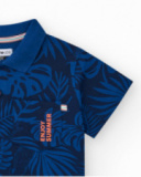 Polo pour garçon en bleu avec imprimé tropical et broderie.
