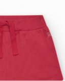 Pantalón corto para niña en rojo con cintura elástica y