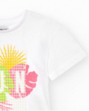 T-shirt pour fille en blanc avec imprimé tropical.