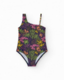 Maillot de bain pour fille en bleu marine avec design asymétrique et imprimé tropical.
