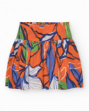 Jupe pour fille en orange avec taille élastique et imprimé floral.
