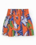 Jupe pour fille en orange avec taille élastique et imprimé floral.