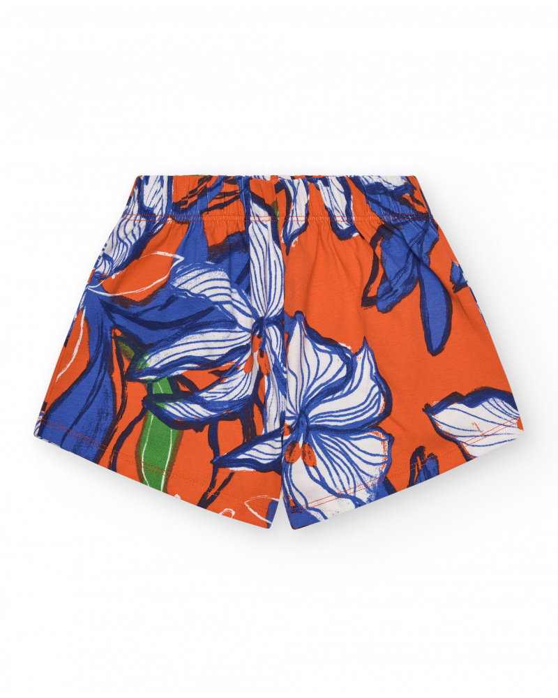Short pour fille en orange avec taille élastique et imprimé floral.
