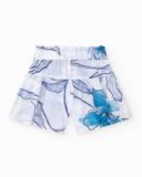 Short pour fille en blanc avec taille élastique et nœud décoratif.