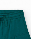 Bermudas pour garçon en vert avec taille élastique et poches latérales