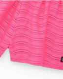 Short multicolore pour fille avec imprimé tropical et taille élastique.