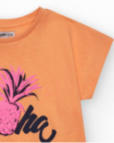 T-shirt à manches courtes pour fille en orange avec imprimé frontal.