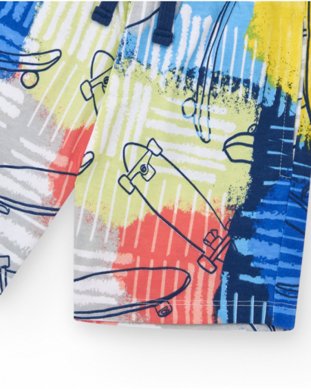 Bermudas pour garçon en bleu avec taille élastique et imprimé multicolore.