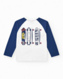 T-shirt à manches longues pour garçon en blanc avec poche verte.