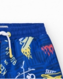 Bermudas pour garçon en bleu avec taille élastique et imprimé skate.