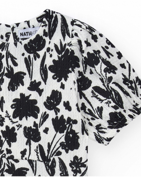 Robe pour fille en blanc et noir avec manches bouffantes et imprimé floral.