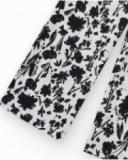 Pantalon pour fille en blanc avec taille élastique et imprimé floral.