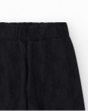 Pantalon pour fille en noir avec taille élastique et broderie.