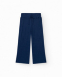 Pantalon pour fille en bleu avec taille élastique et cordon de serrage.