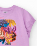 T-shirt pour fille en lilas avec sequins et ourlet courbé.